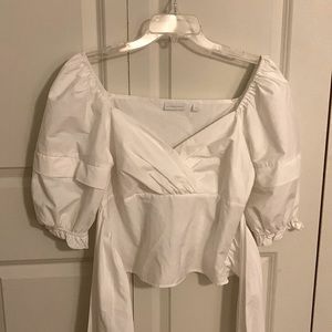 White blouse with puffy sleeves and wrap around waist tie